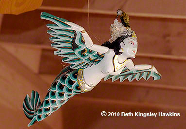 Black-chinned hummingbird nest on a 'flying mermaid' sculpture, which I called the Dragonlady